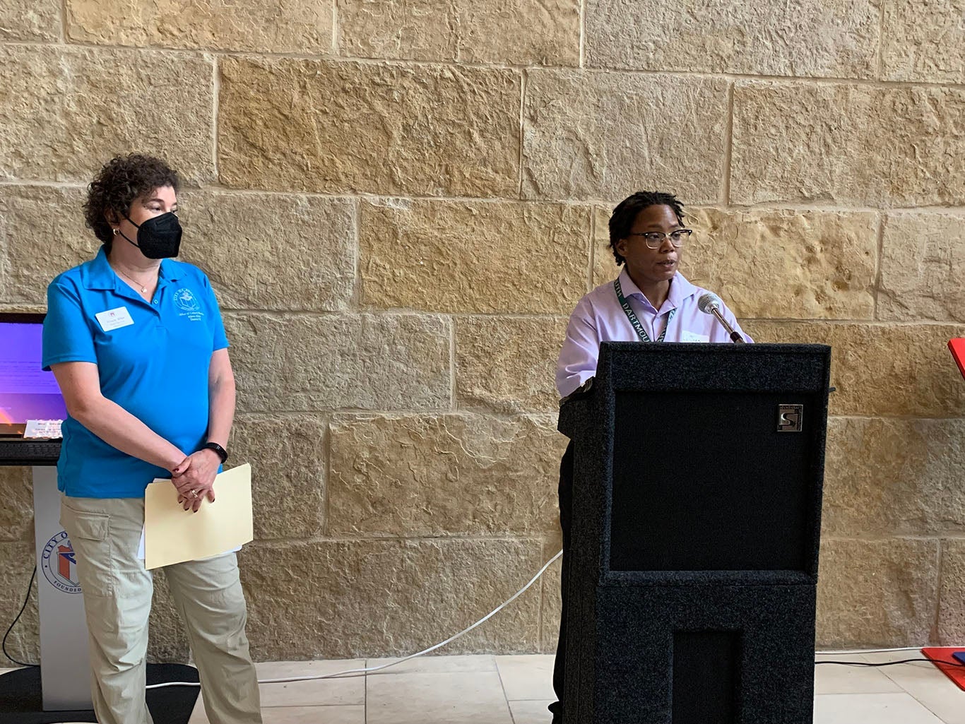 LaJuan Tucker (R) delivers opening remarks and introduces Mayor Pro-Tem Alison Alter (L). Photo Credit: Weston Rose.