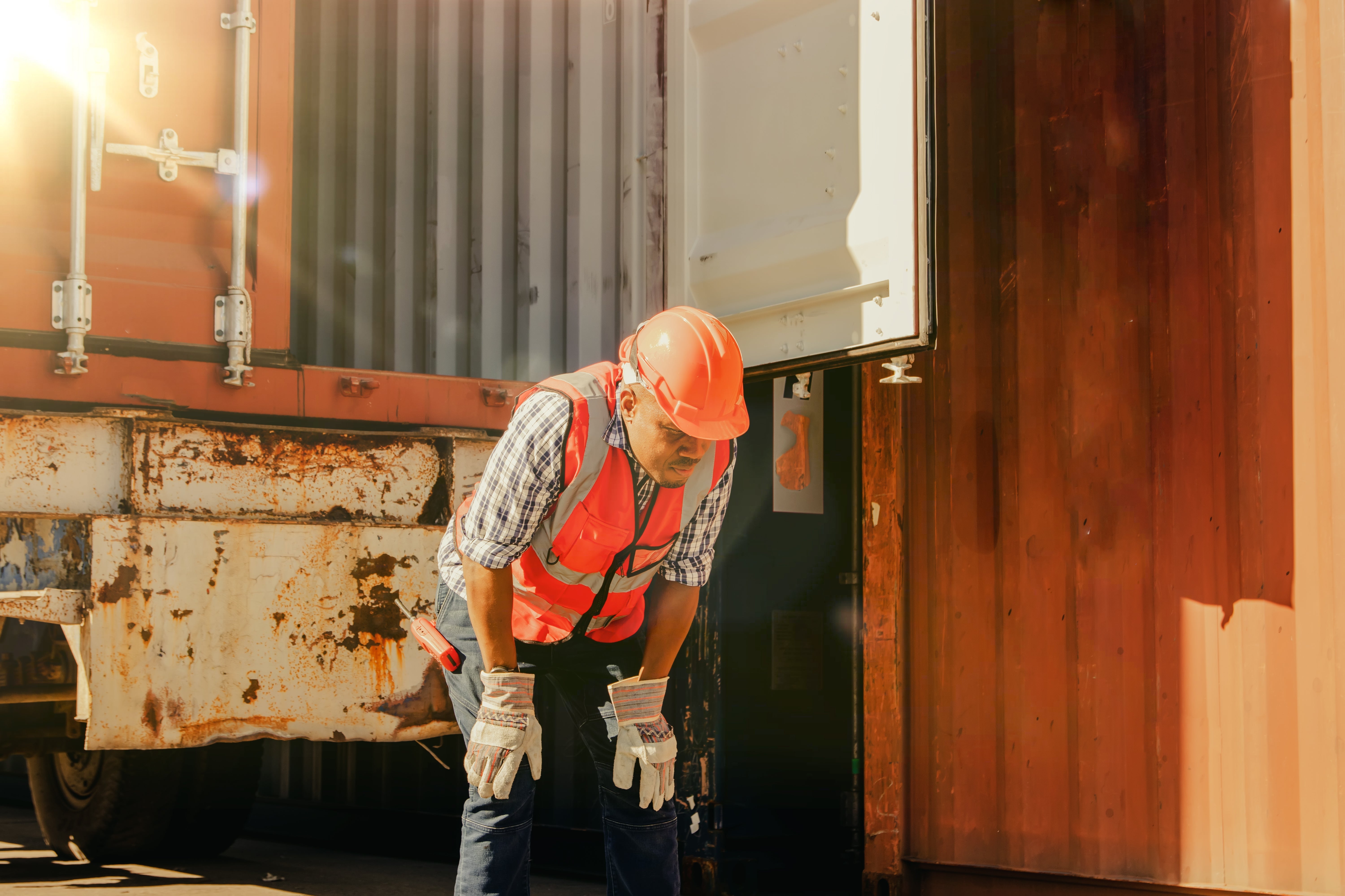 A worker struggles in the heat (Adobe Stock Image #637159967)