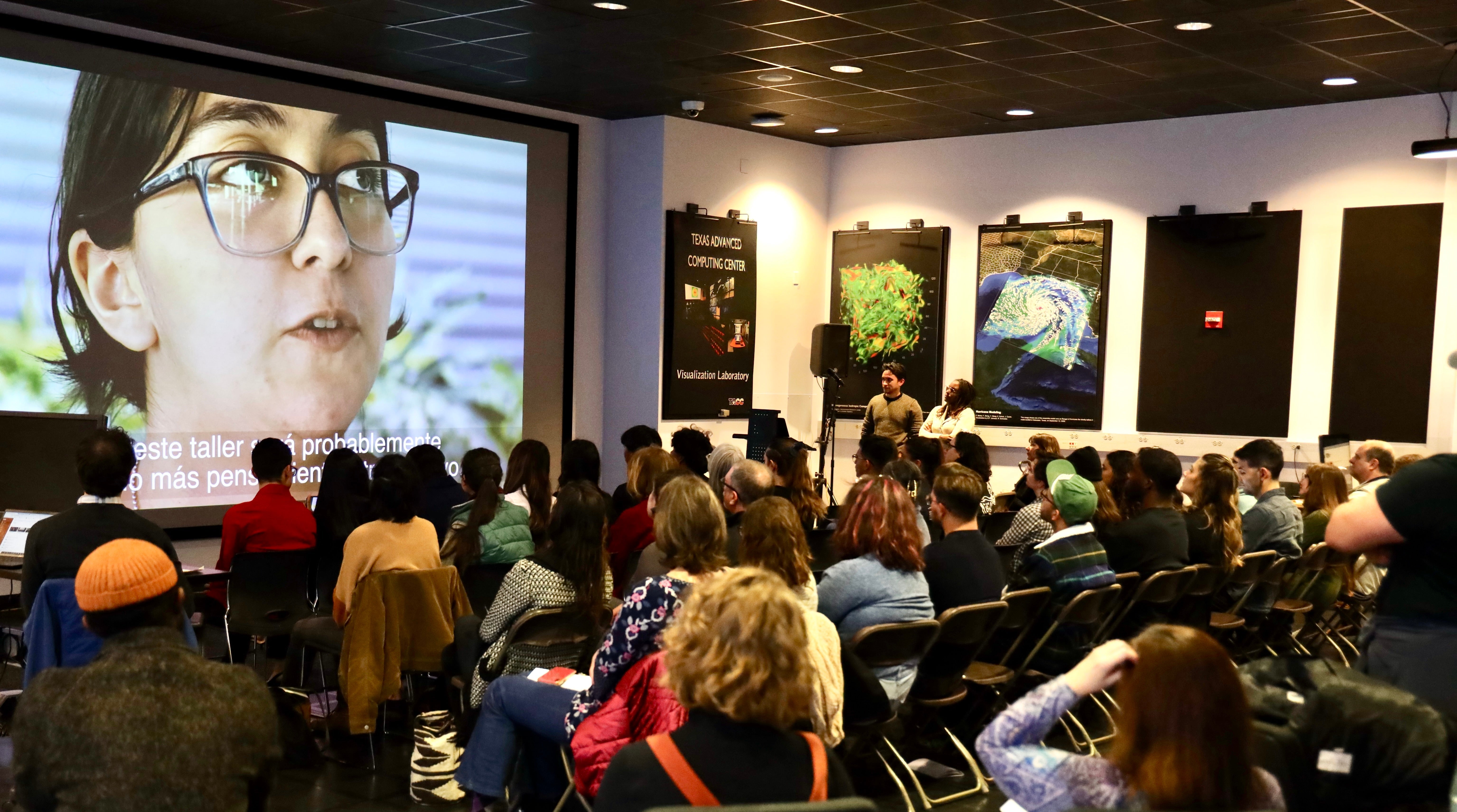 Students showcase PT2050 projects at the Texas Advanced Computing Center (TACC) Visualization Lab.
