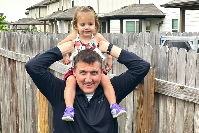 Brandon Norwat with his two-year-old granddaughter Ayla