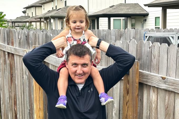 Brandon Norwat with his two-year-old granddaughter Ayla