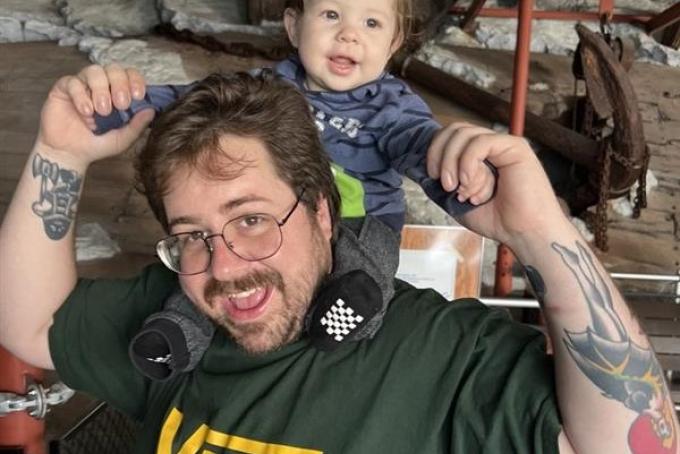 OVPR Senior Administrative Associate Michael Humphrey with his two-year-old son, Sam